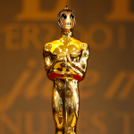 Oscar trophy with Not An Accountant's profile picture edited onto the head